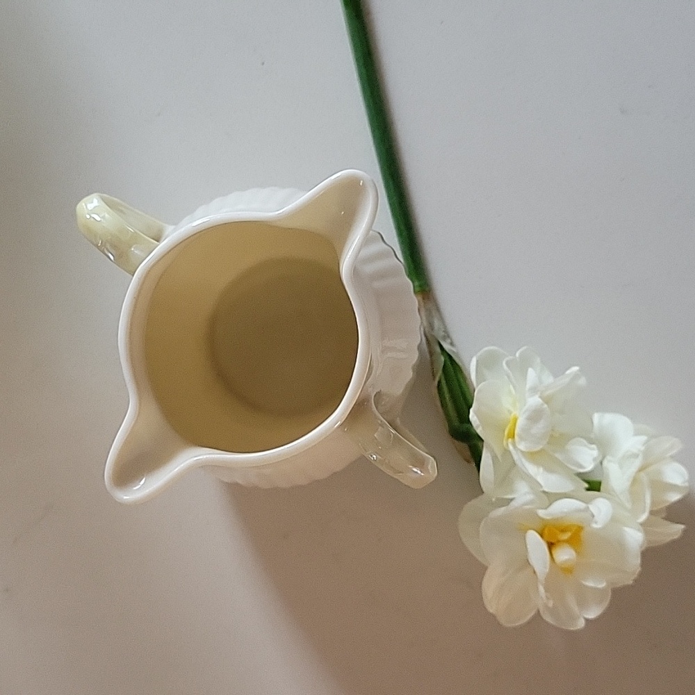 Belleek double lip creamer